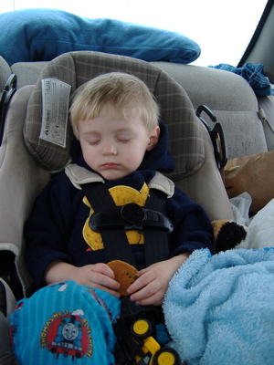 Tristen sleeping in car seat.