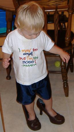 Tristen trying on Mama's shoes.